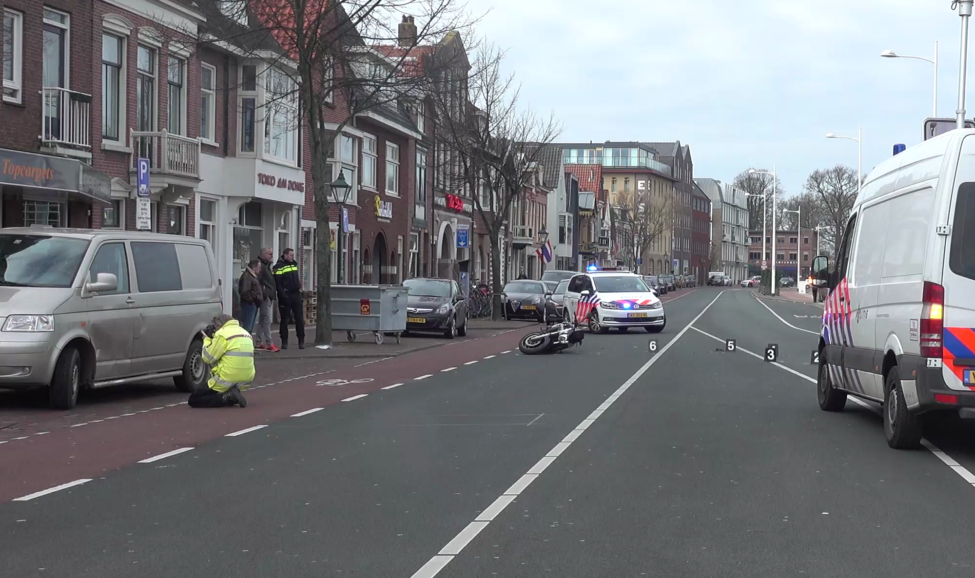 Verkeersongeval tussen motorrijder en bestelbus op Kanaalkade