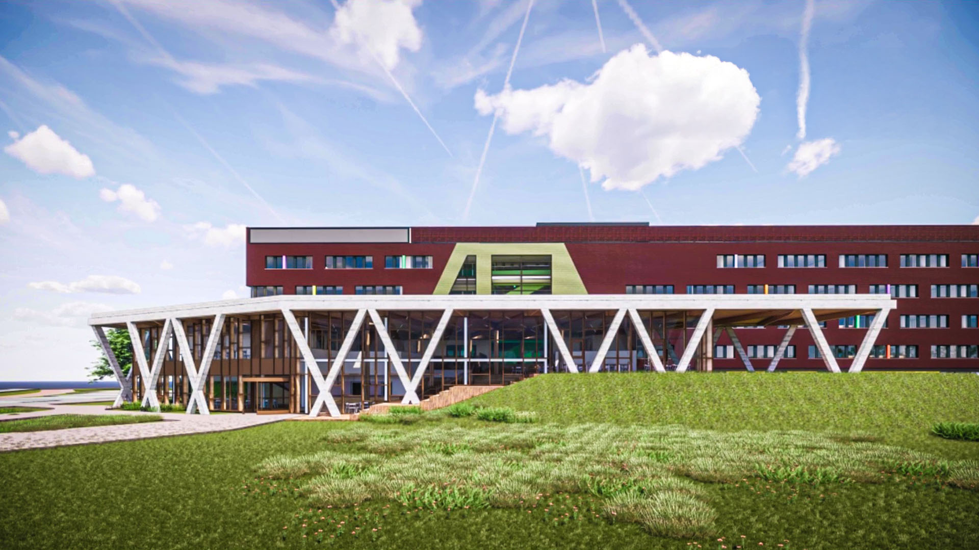 Modern gebouw met rode bakstenen gevel, grote ramen en een overdekte ingang ondersteund door witte zuilen, gelegen naast een grasveld onder een blauwe hemel.