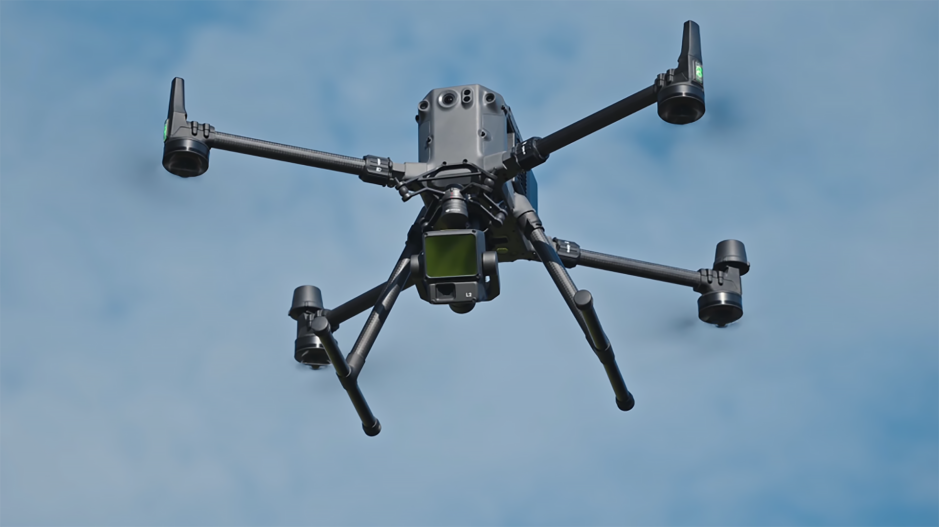 Een drone met vier rotorbladen vliegt in de lucht tegen een blauwe hemel met enkele wolken.