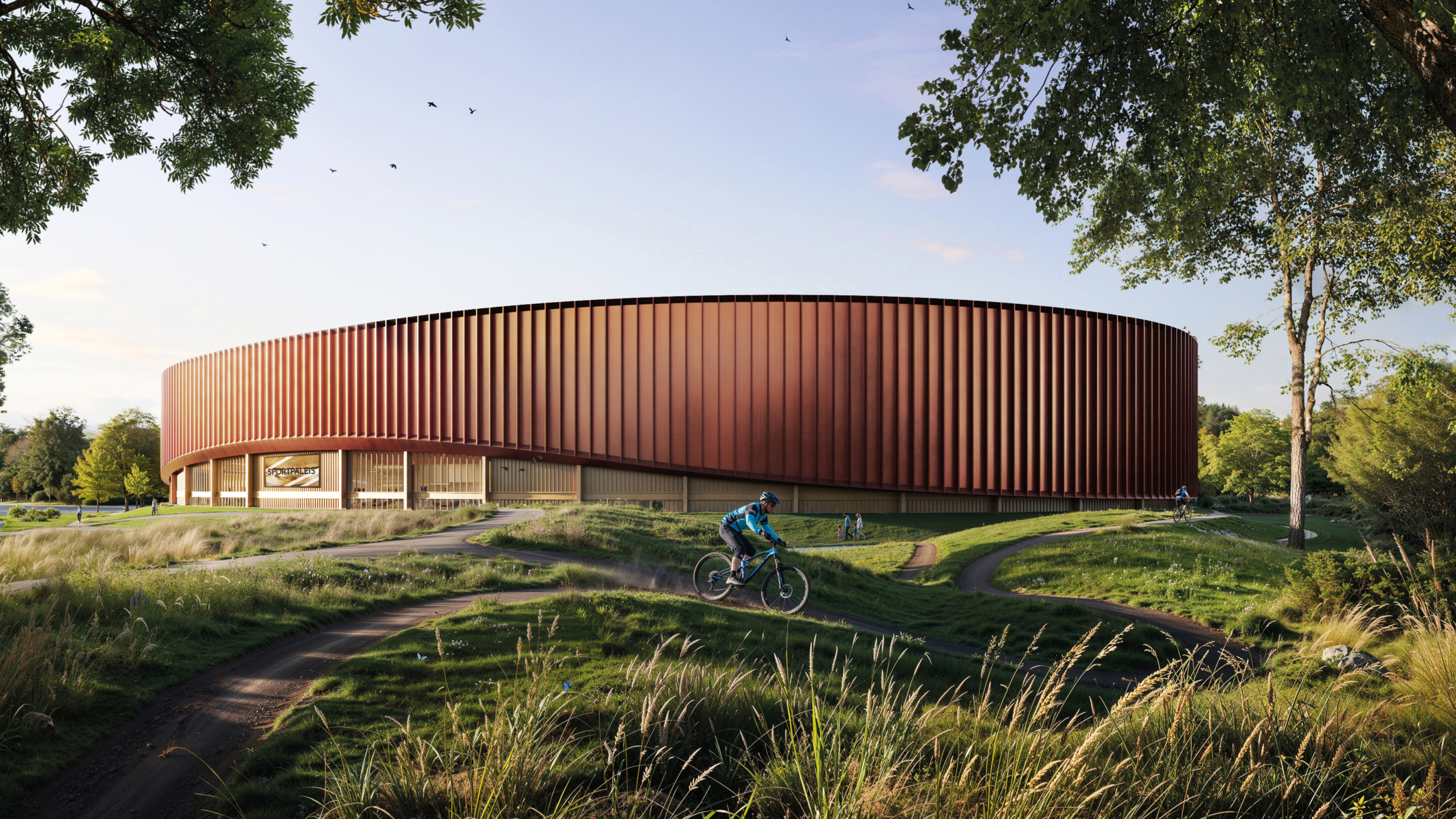 Ronde sporthal met roodbruine lamellengevel in een groen park, met fietsers op slingerende paden op de voorgrond